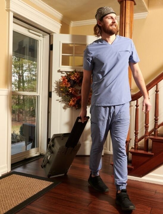 EEG technologist entering a patient’s home